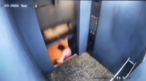 Man Nearly Gets Sliced In Half By Elevator Malfunction (Caught On Camera)